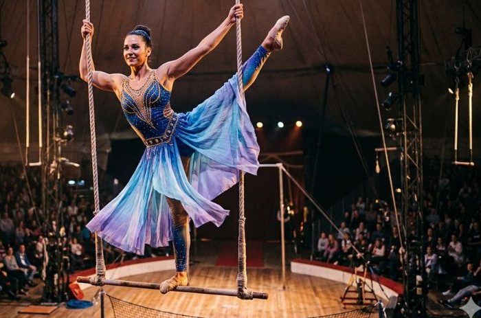 Lady in skirt acrobat